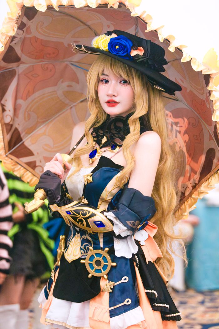 contact-img Vibrant anime-inspired cosplay featuring a woman with a decorative umbrella in hand.